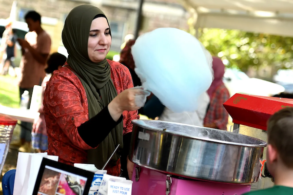 Another hard-working volunteer making cotton candy!